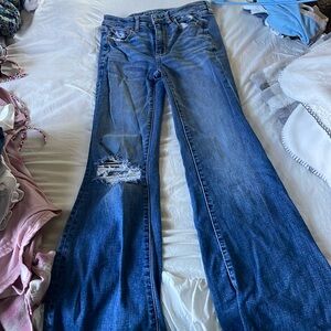 American Eagle Bell Bottom Jeans With Rips